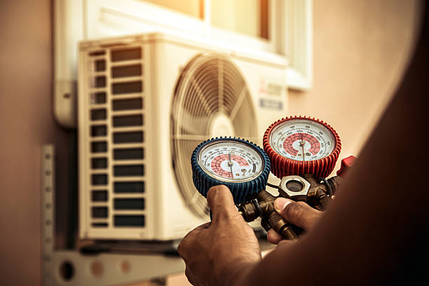Professional Hvac technician working in Atkins, IA